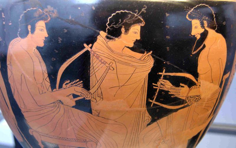 Greek pottery decorated with images of musicians.